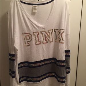 Pink long sleeve shirt.